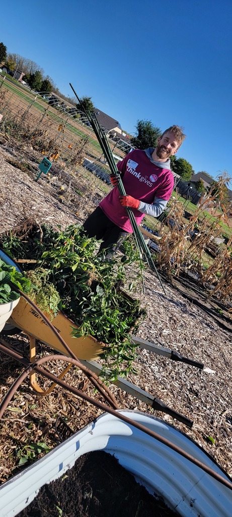 Think Bank volunteers at ALC community garden