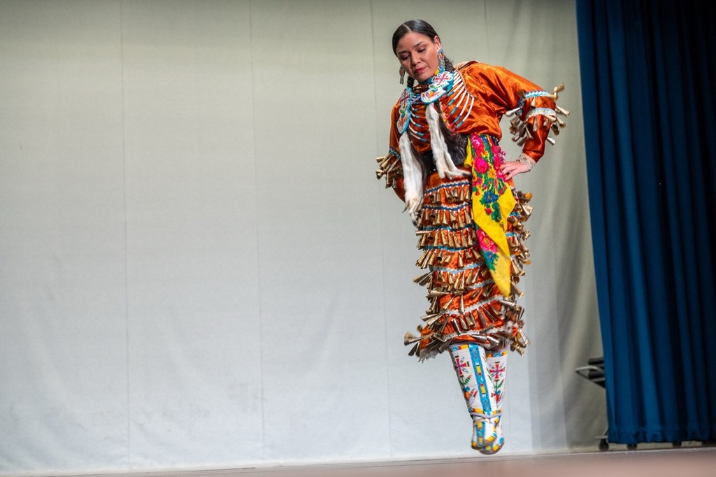 Jingle dancer mid-air