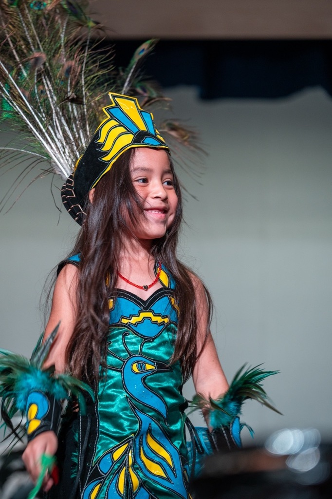 Young Aztec dancer learning the practice of dance.