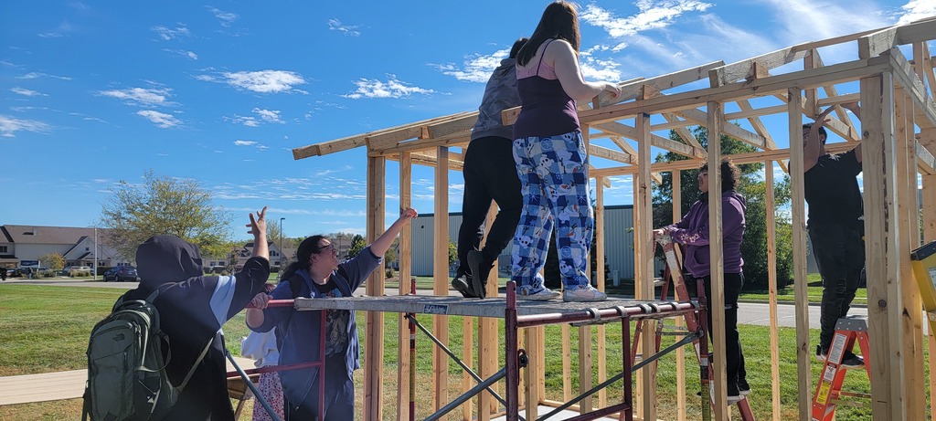 ALC Youth Build students working on a shed