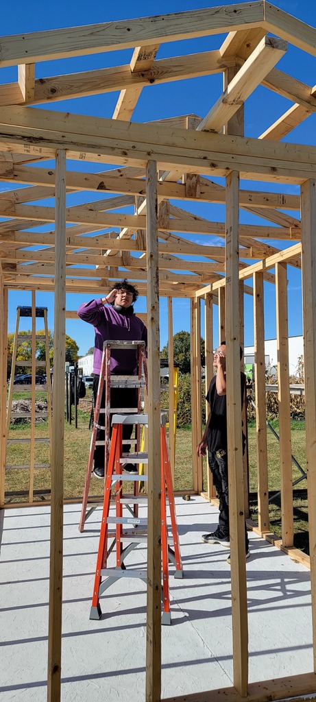 ALC Youth Build students working on a shed