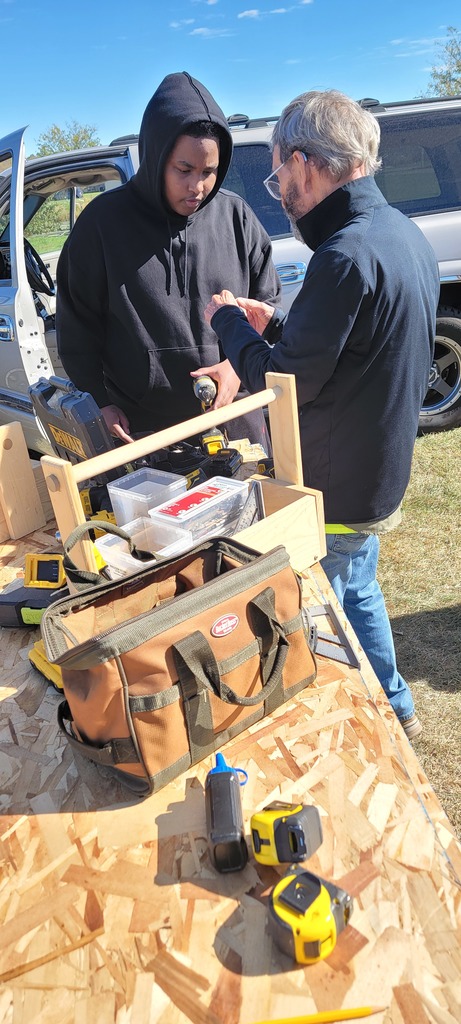 ALC Youth Build students working on a shed