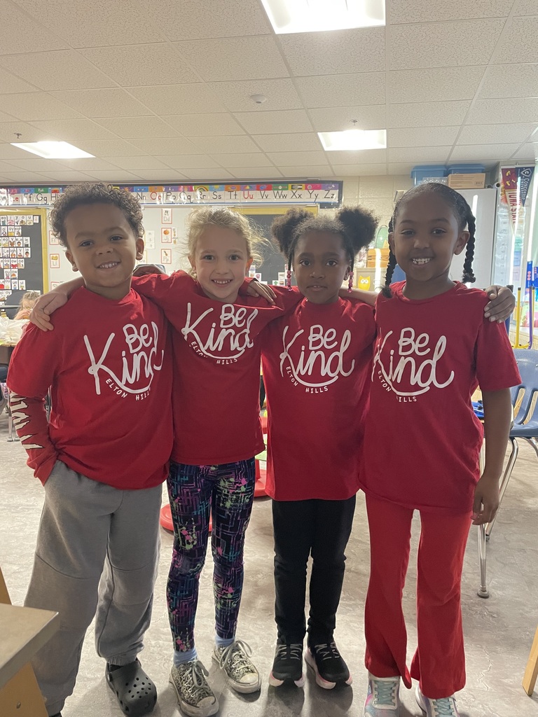 1st graders wearing red Be Kind t-shirts.