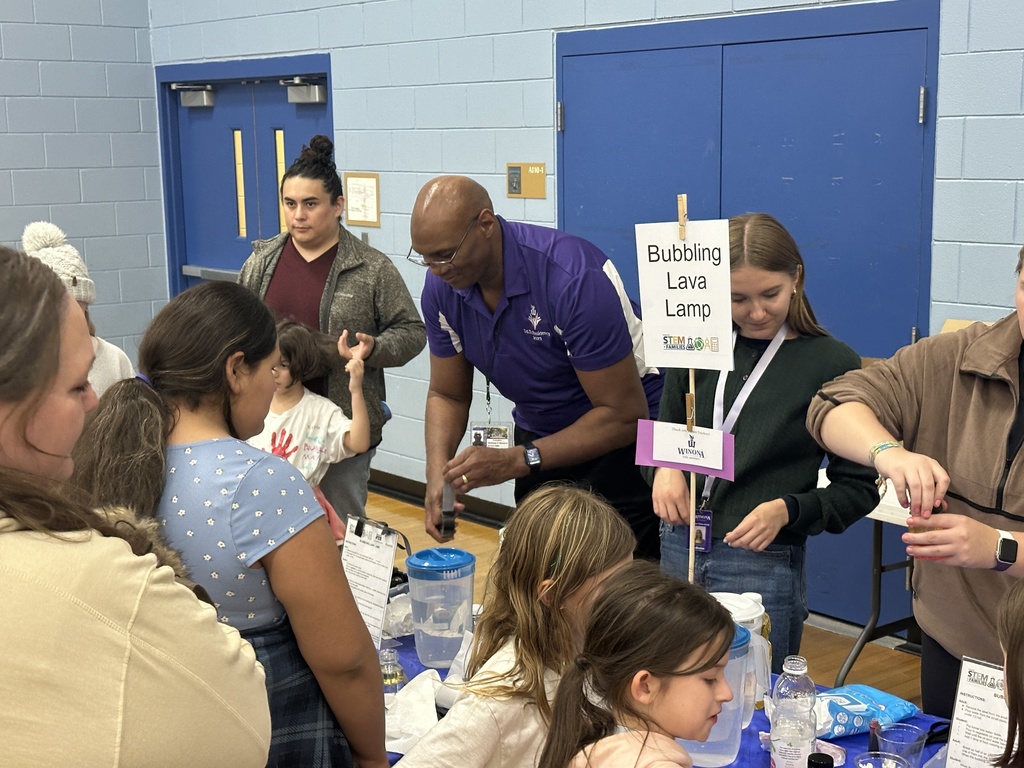 Teachers helping students