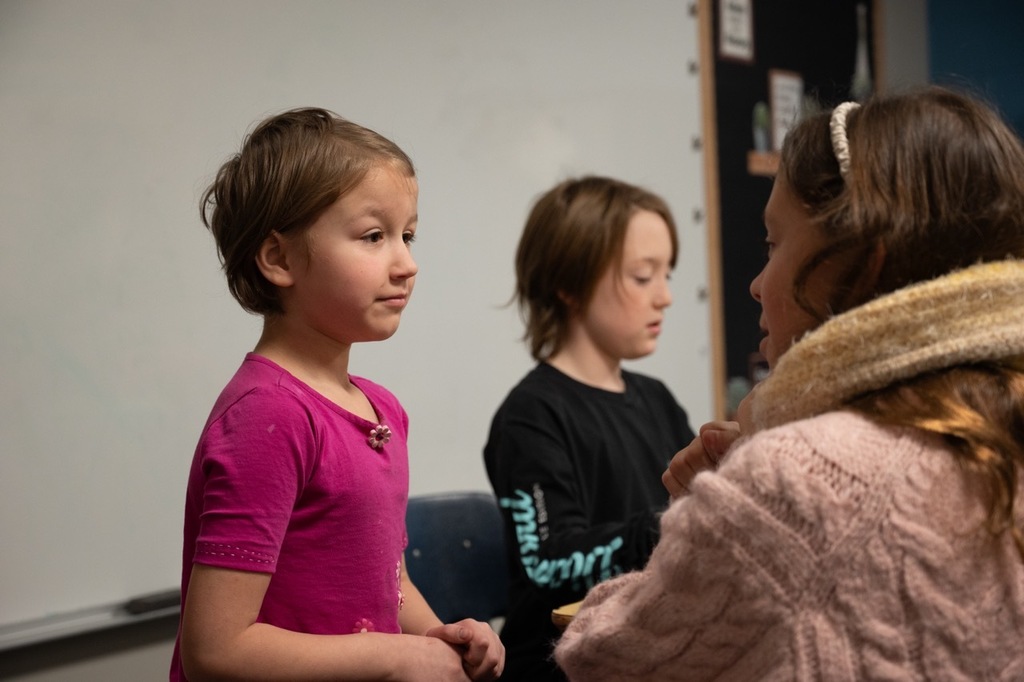 AIE students at Bamber Valley in conversation about student awards.