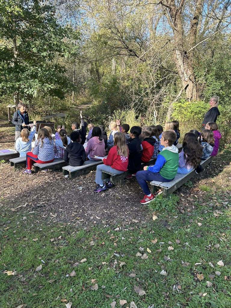 Students at Quarry Hill in an outdoor classroom