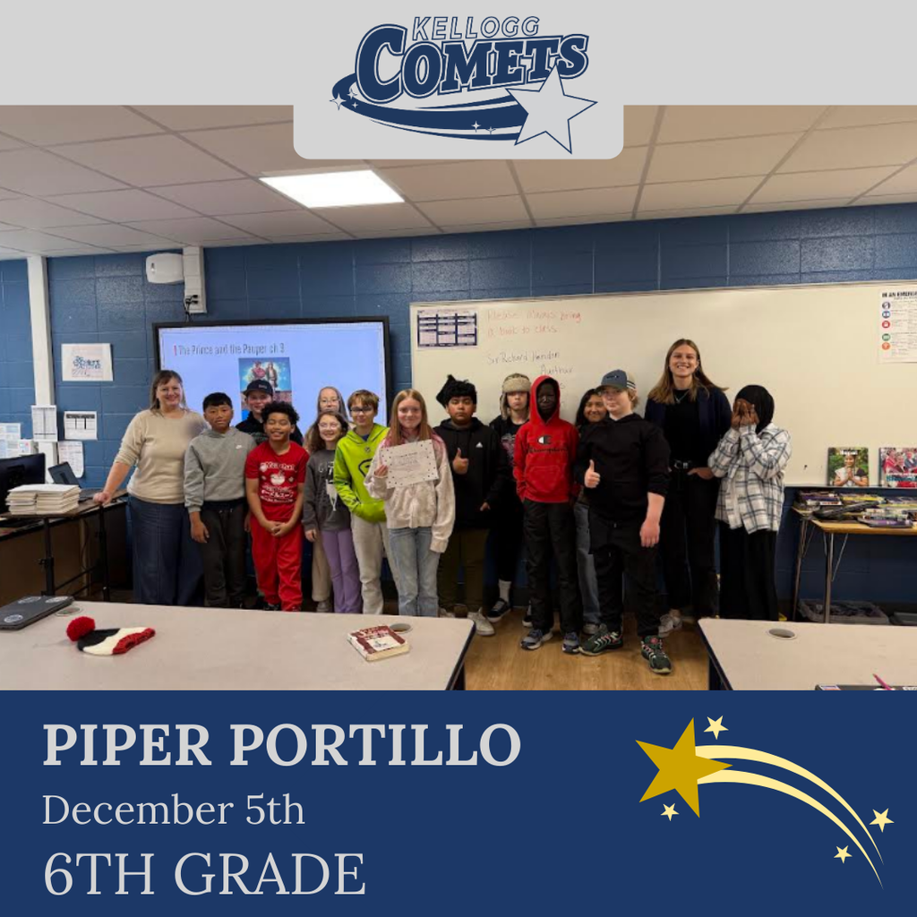 classroom of students in multicolored clothing, student in middle holding certificate for student of the week