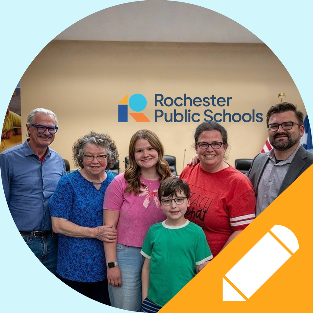 Family standing in support of their high school student who signed a commitment to become a future educator.