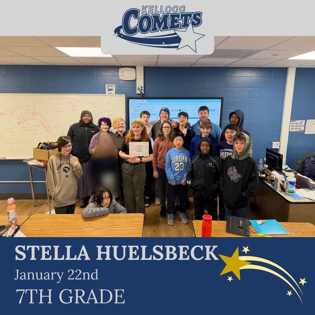 Group of students in multicolored clothing standing and smiling for a student who received award