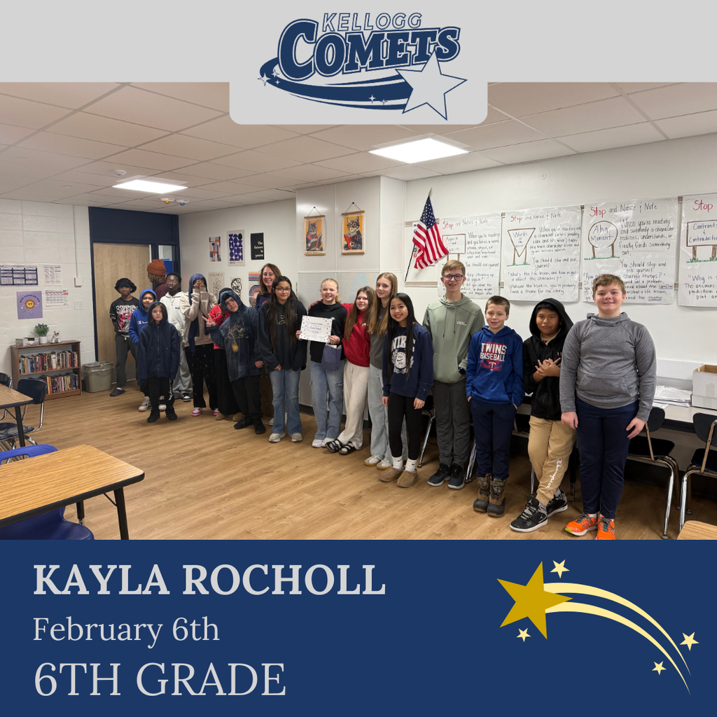 Group of students in multicolored clothing standing and smiling for a student who received award