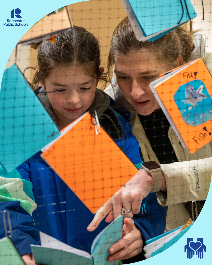 Caregiver points out a page to her student on the word net