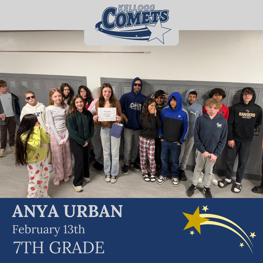 Group of students in multicolored clothing standing and smiling for a student who received award