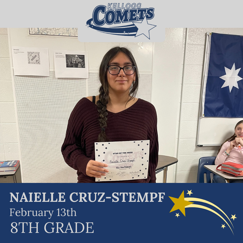 Group of students in multicolored clothing standing and smiling for a student who received award