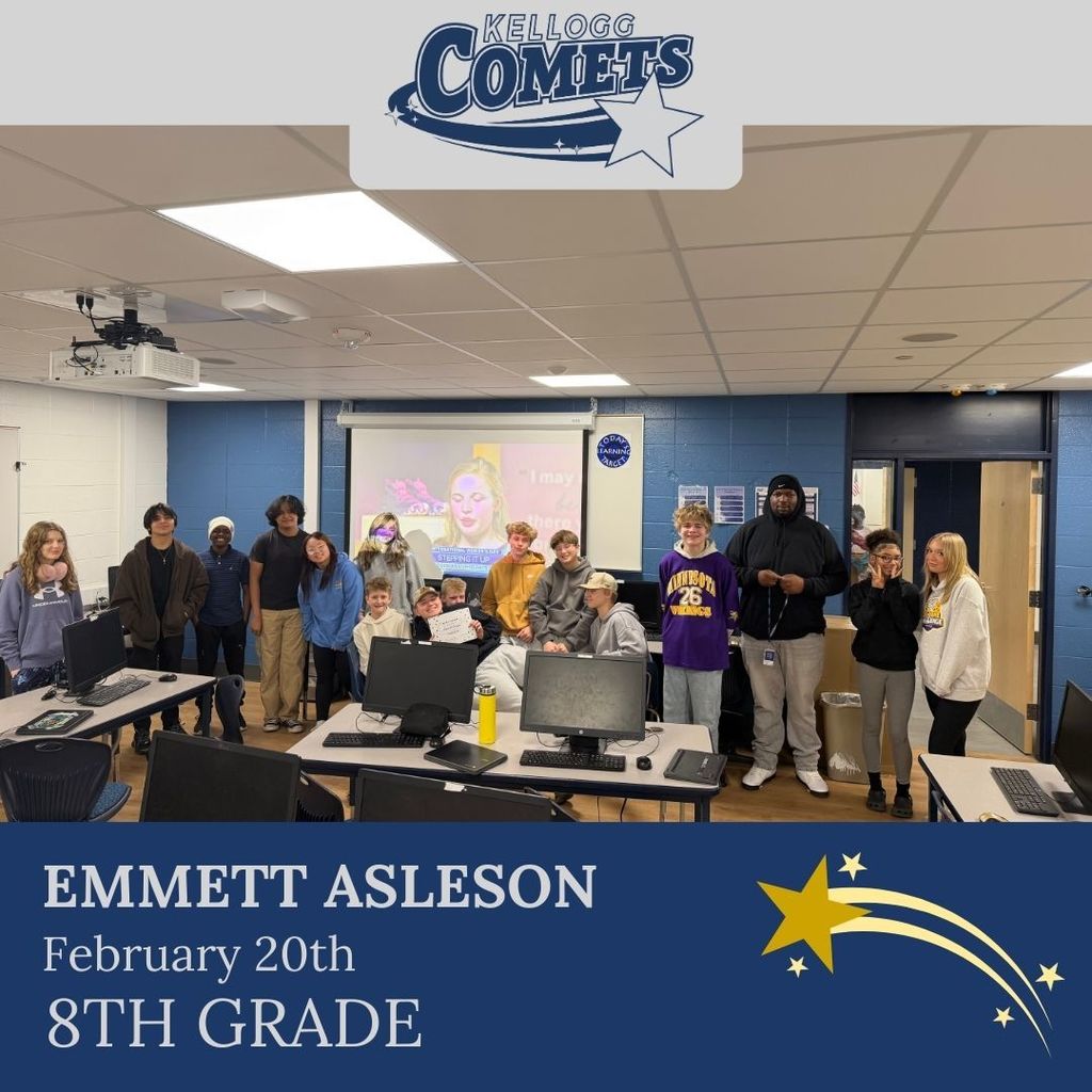 Group of students in multicolored clothing standing and smiling for a student who received award
