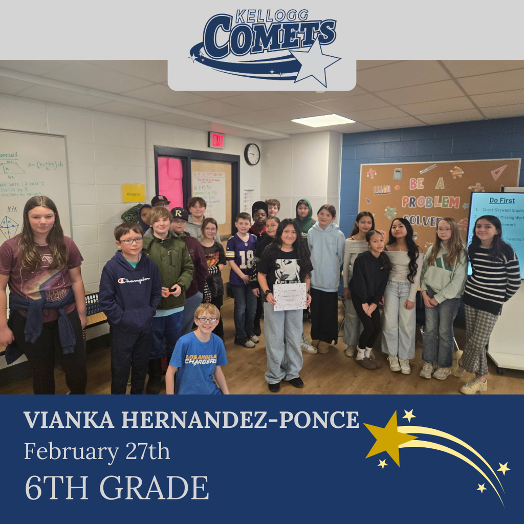 Group of students in multicolored clothing standing and smiling for a student who received award