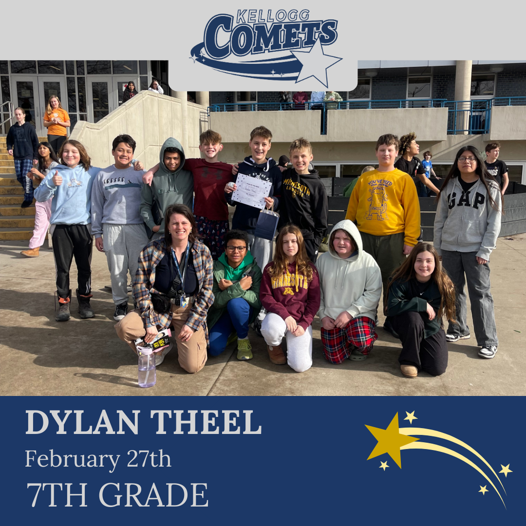 Group of students in multicolored clothing standing and smiling for a student who received award