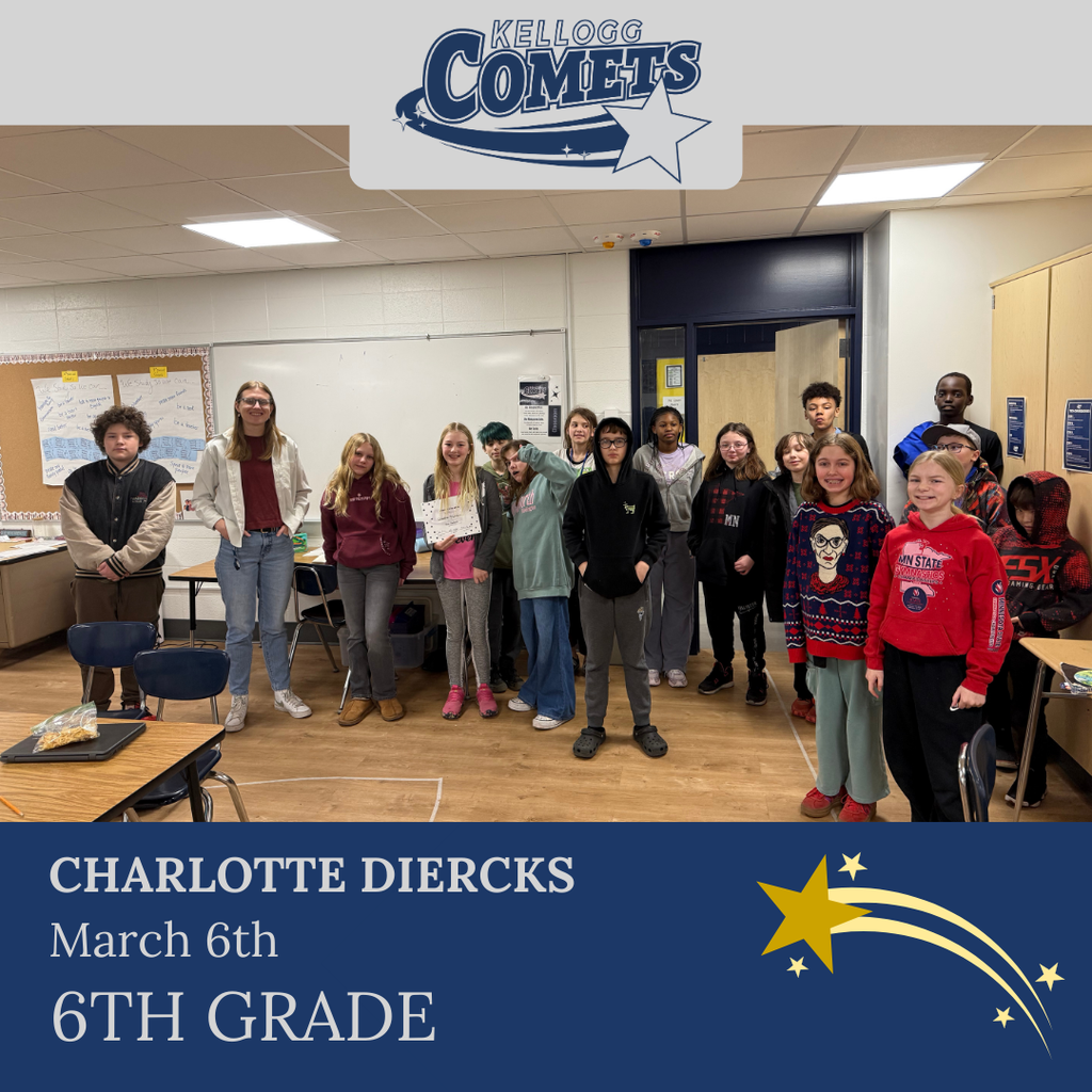 Group of students in multicolored clothing standing and smiling for a student who received award