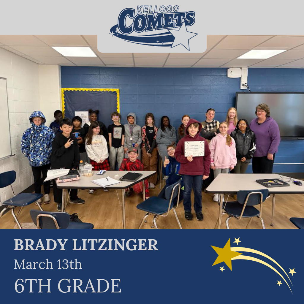 Group of students in multicolored clothing standing and smiling for a student who received award