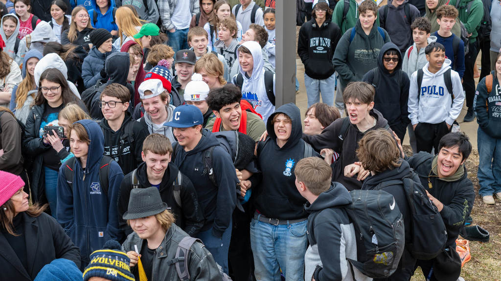 Outside a group of high school boys get pumped up for the Polar Plunge.