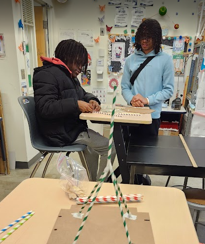 An IBM engineer came to visit and gave the students a challenge to build a cell tower that could withstand an earthquake