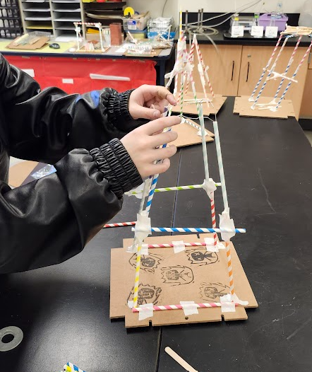 An IBM engineer came to visit and gave the students a challenge to build a cell tower that could withstand an earthquake