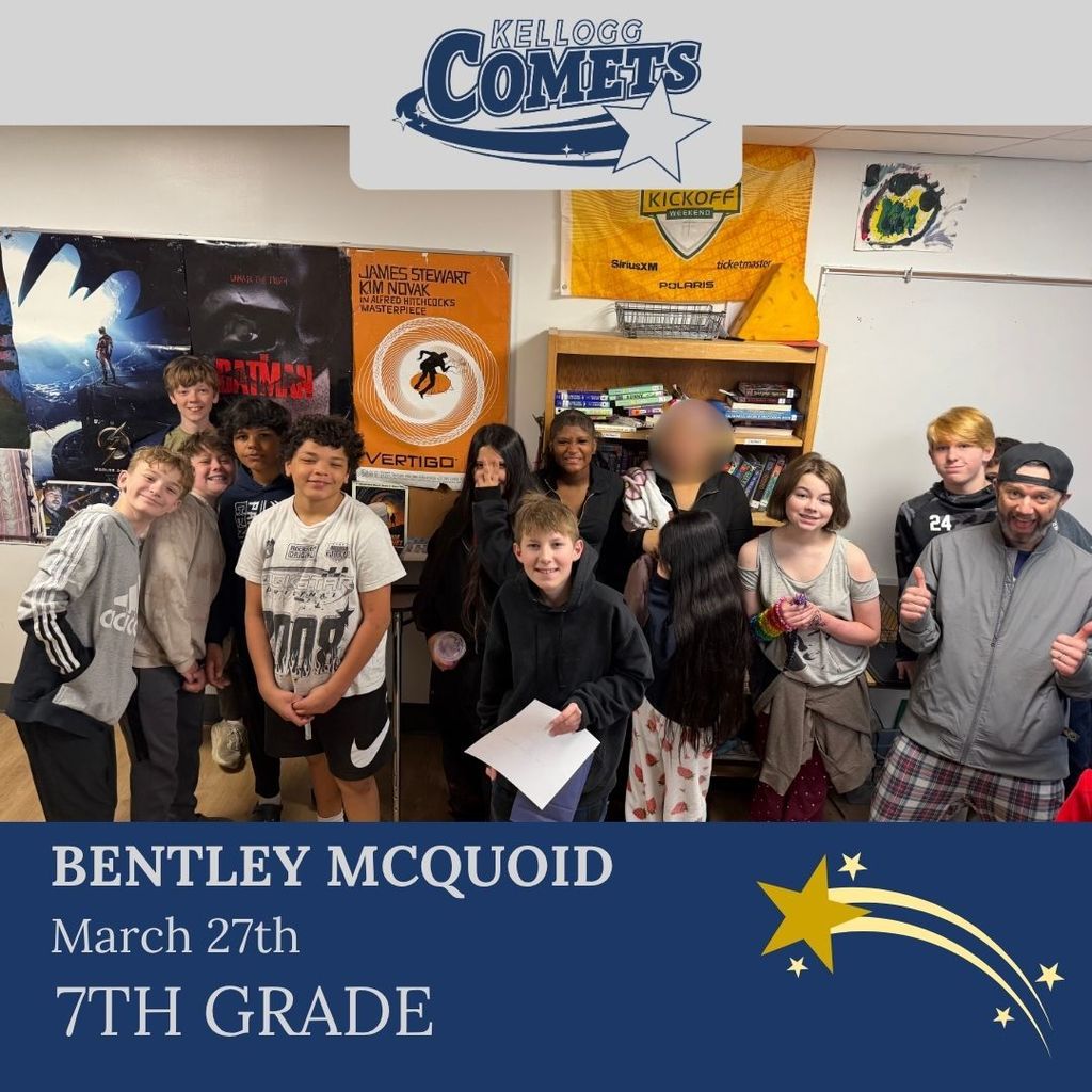 Group of students in multicolored clothing standing and smiling for a student who received award