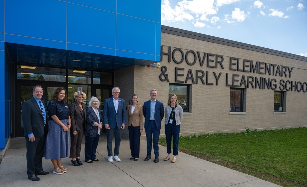Commissioner Paul Marquart, Director of Early Childhood Erica Schumacher, Head Start representatives, Governor Tim Walz, Mayor Kim Norton, Superintendent Pekel, and Principal Emily Pearson outside of Hoover Early Learning School