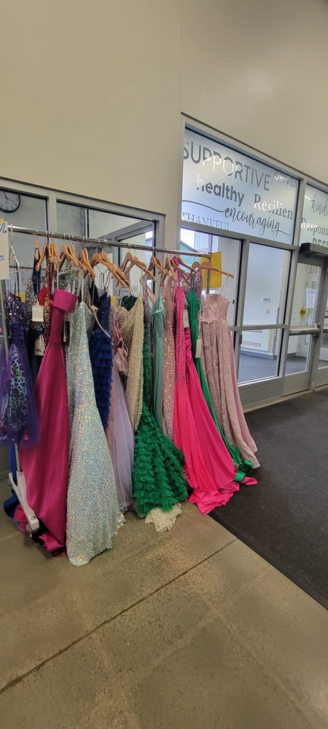 prom dresses on a rack