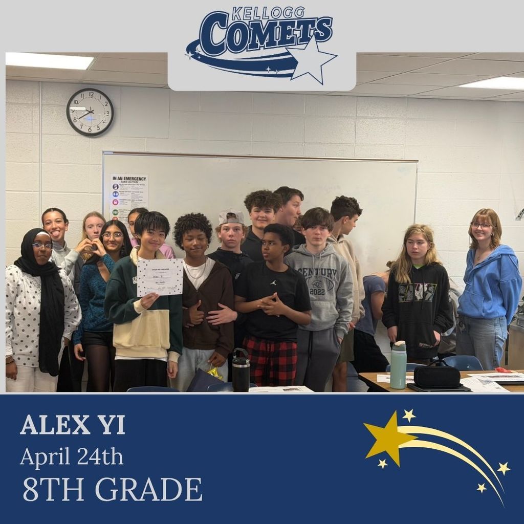 Group of students in multicolored clothing standing and smiling for a student who received award