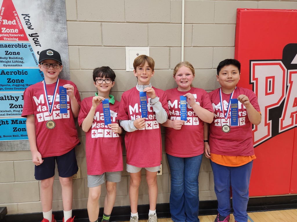 Five Washington students holding up their blue ribbons to the camera to celebrate their wins.