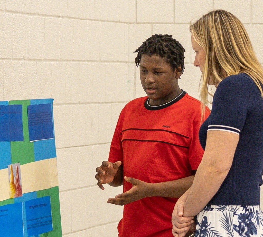 student explaining project