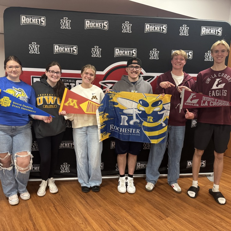 students show off their college flags 