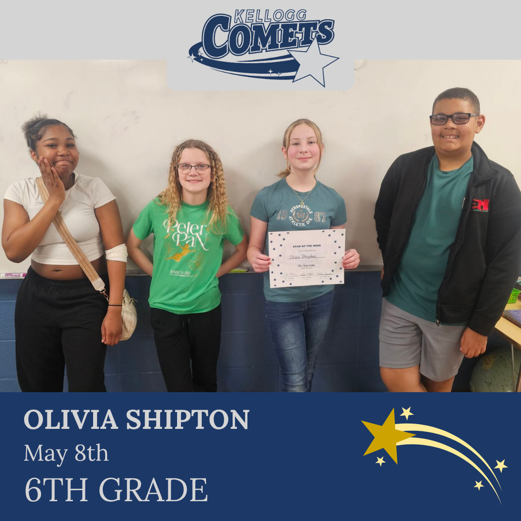 Group of students in multicolored clothing standing and smiling for a student who received award