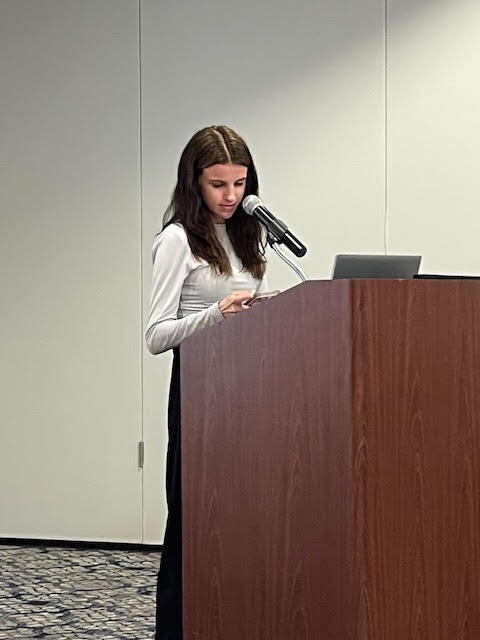 student at podium