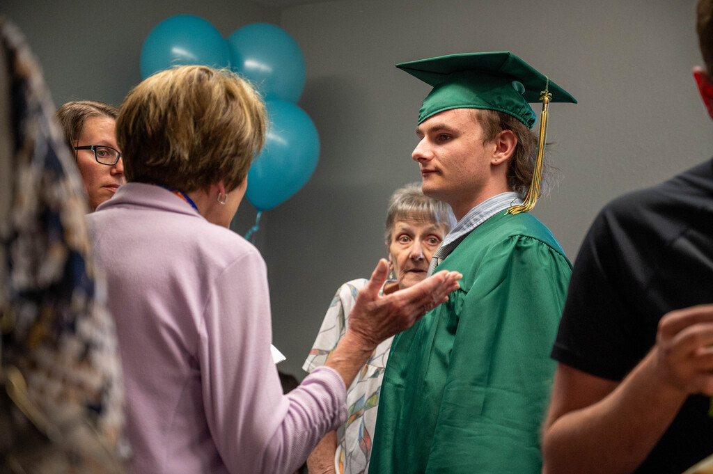 LEAP Graduate speaks with RPS school board member Jean Marvin