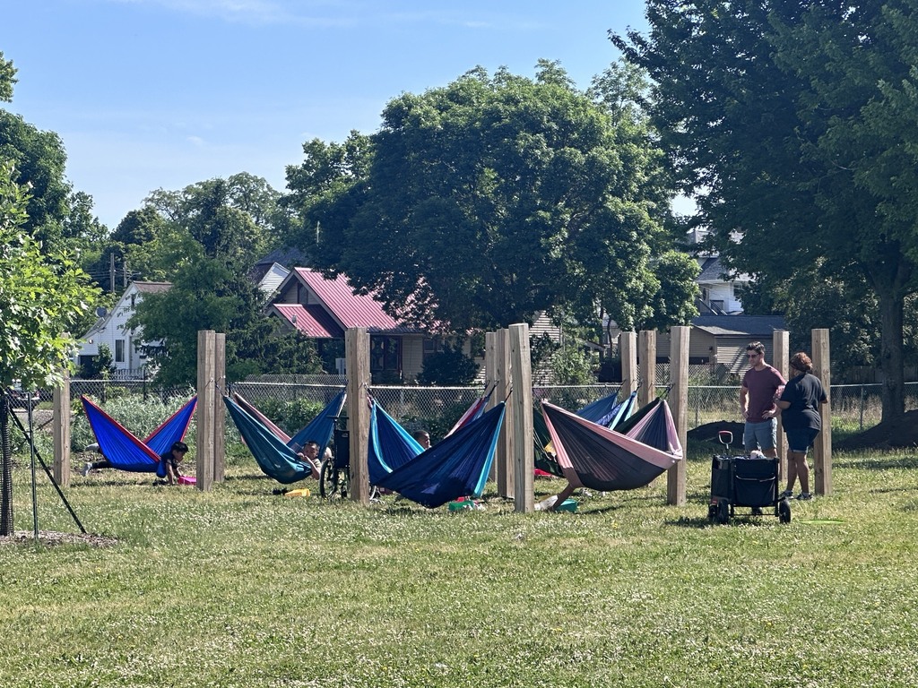 Children reading in hammocks