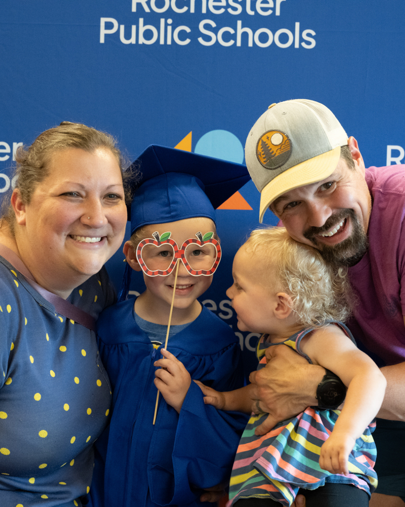preschool graduate smiling at the camera
