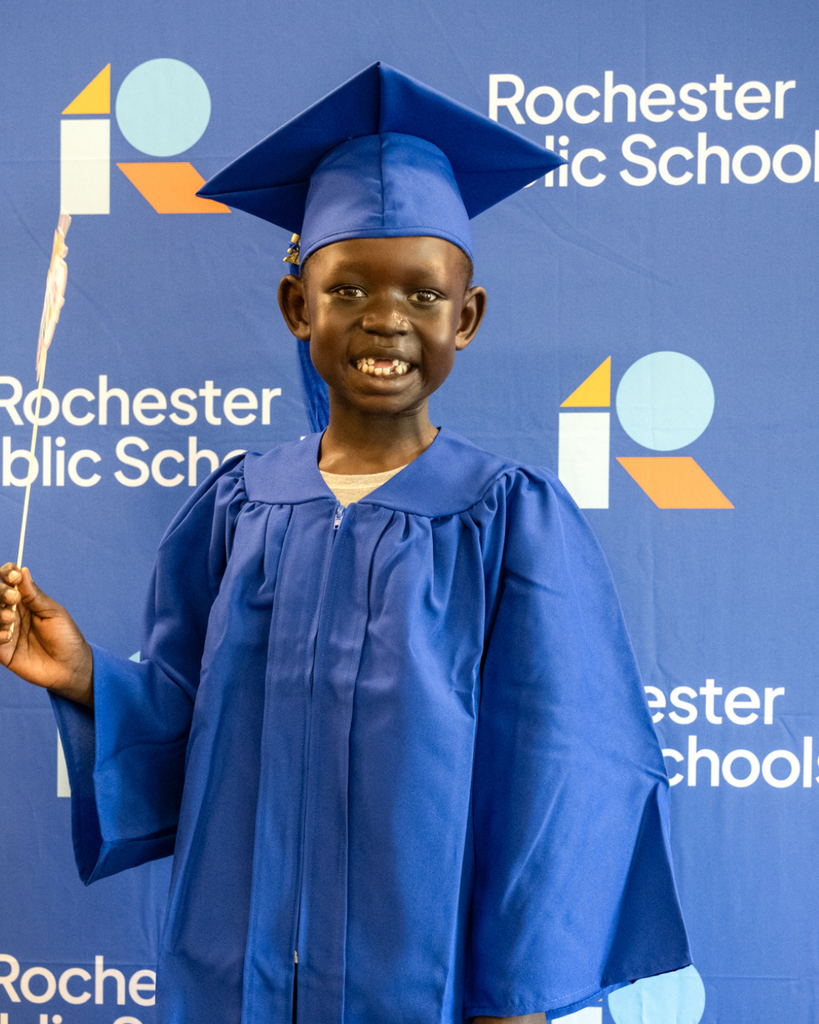 preschool graduate smiling at the camera