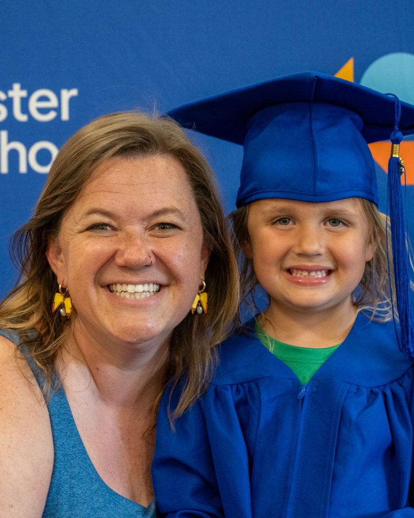 preschool graduate smiling at the camera