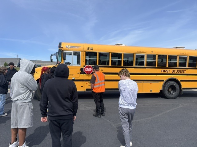 discussing the cameras and the flashing lights on the bus