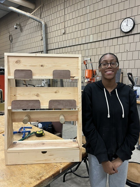 Janay with her final Tech device project