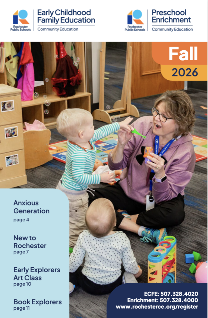 Fall ECFE catalog cover with image of an ecfe teacher playing with babies on the floor of the classroom.