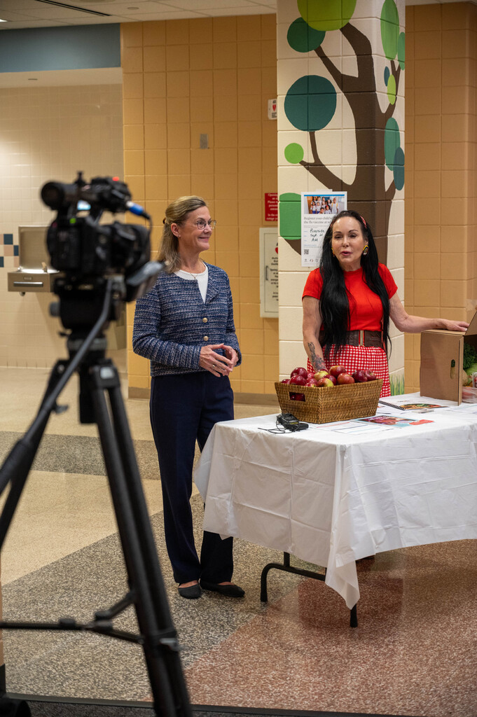 Kim Norton and Lisa Schutz speak with media at Riverside Central Elementary