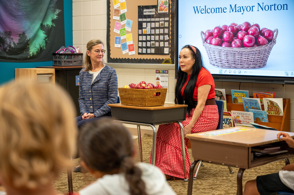 Kim Norton and Lisa Schutz talk to third grade students at Riverside Central Elementary