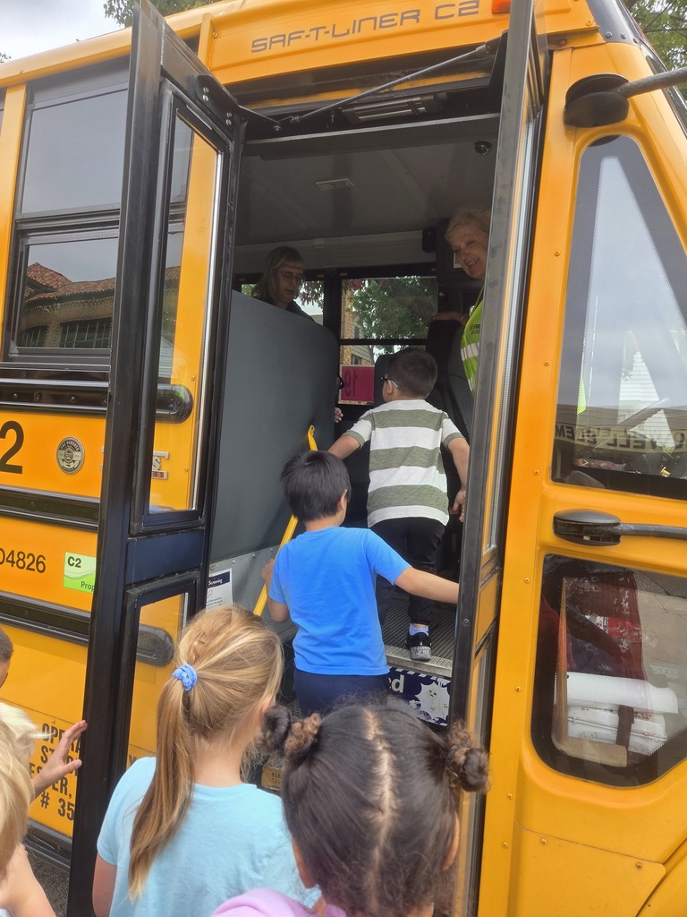 Mrs. K's 1st graders boarding the bus safely