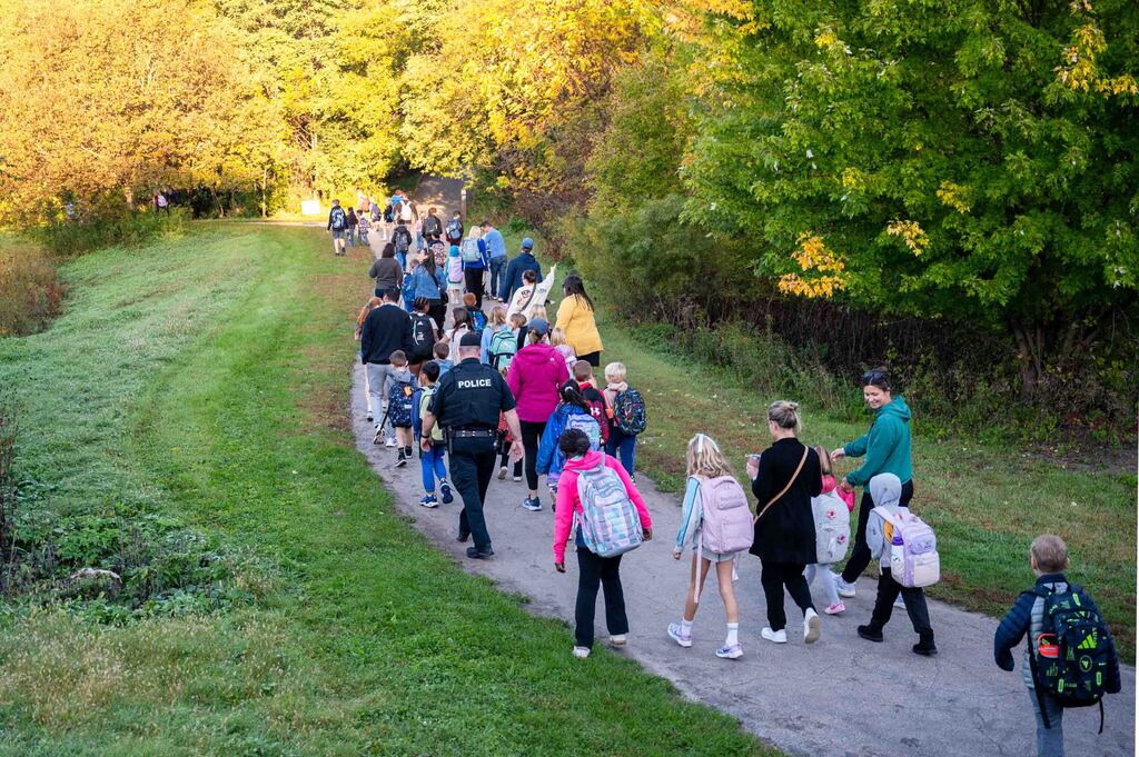 Students and adults walking