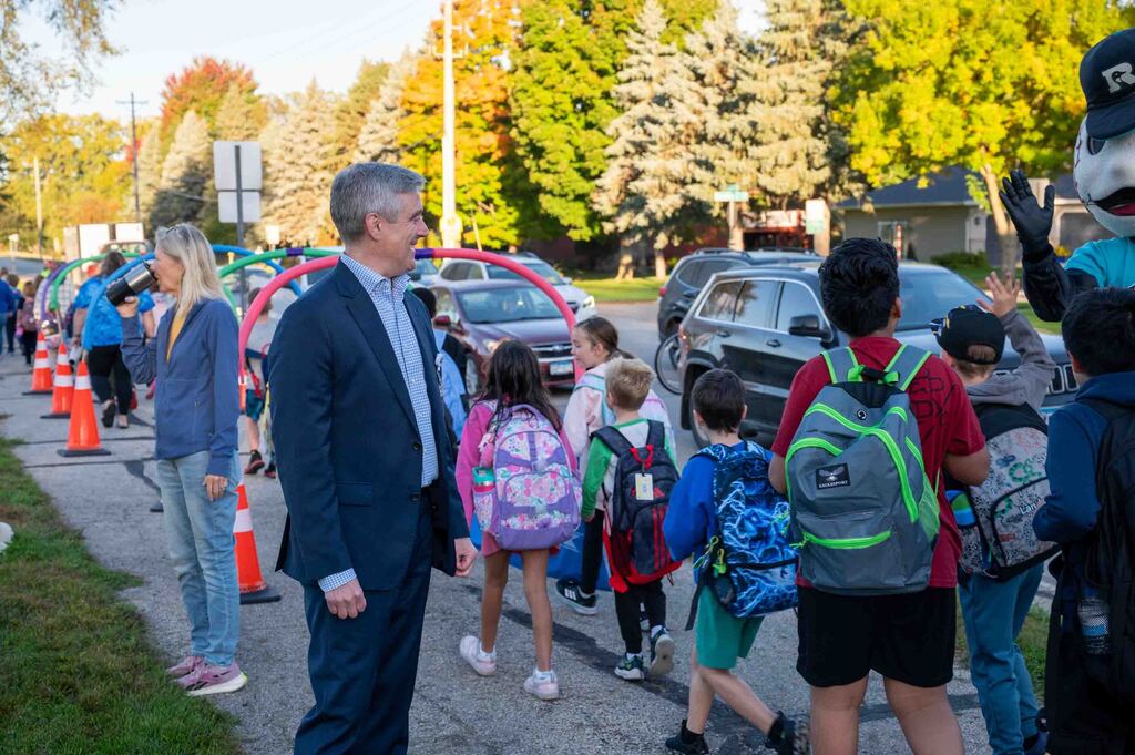Superintendent Dr. Kent Pekel with students