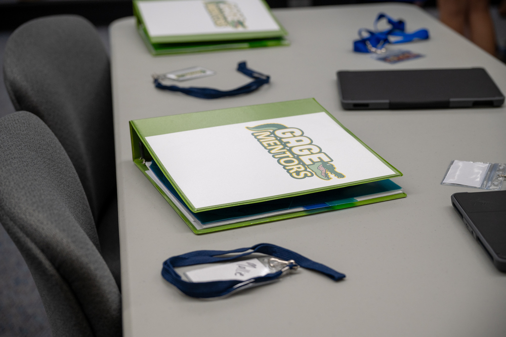 Folder with "Gage Mentors" on the cover