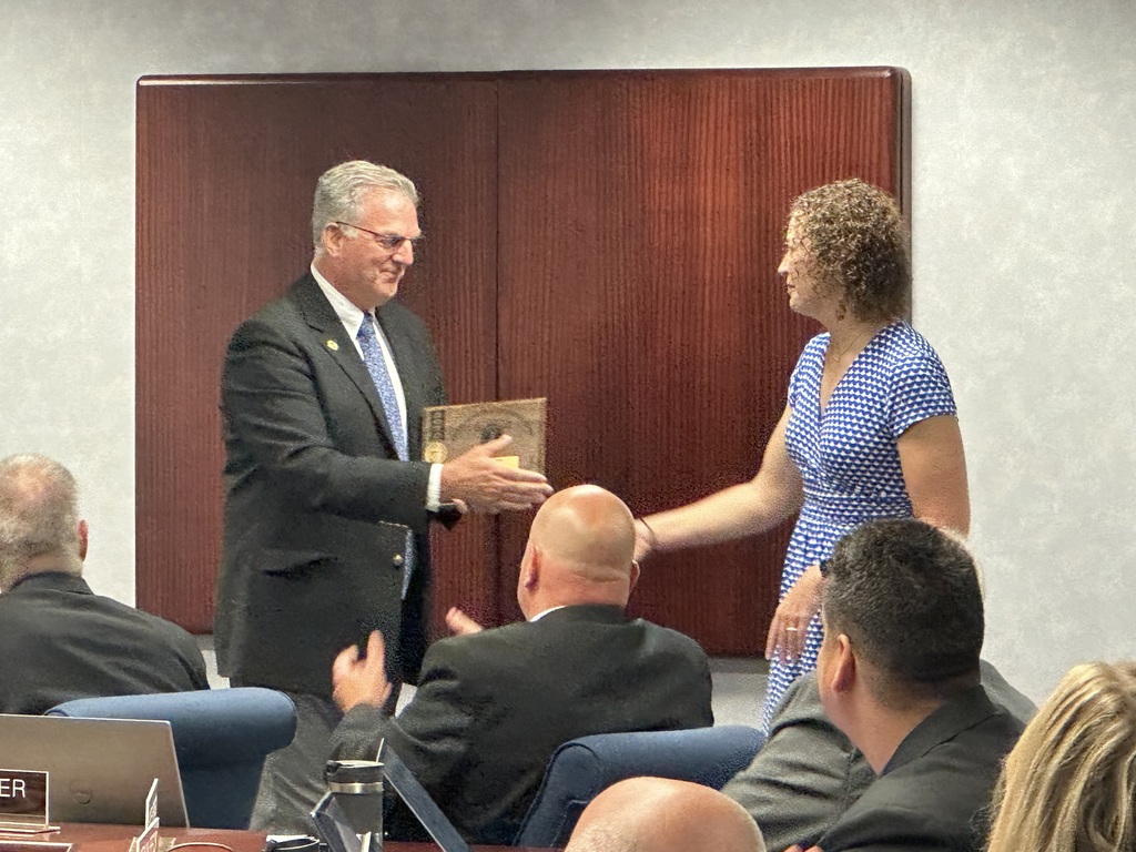 Amanda Kaus receiving her award