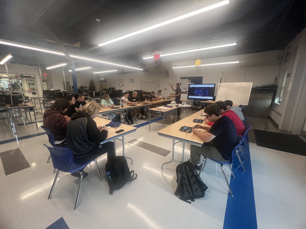 Engineering students calibrating tools 